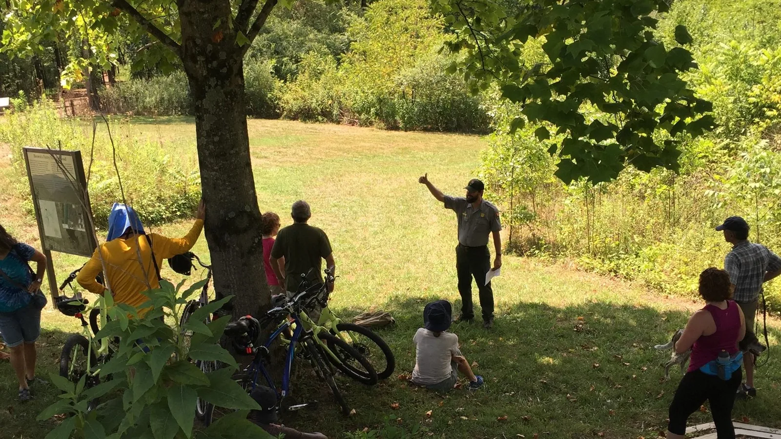 National Park Service ranger speaking with visitors along the Brown's Ferry Federal Road on Moccasin Bend